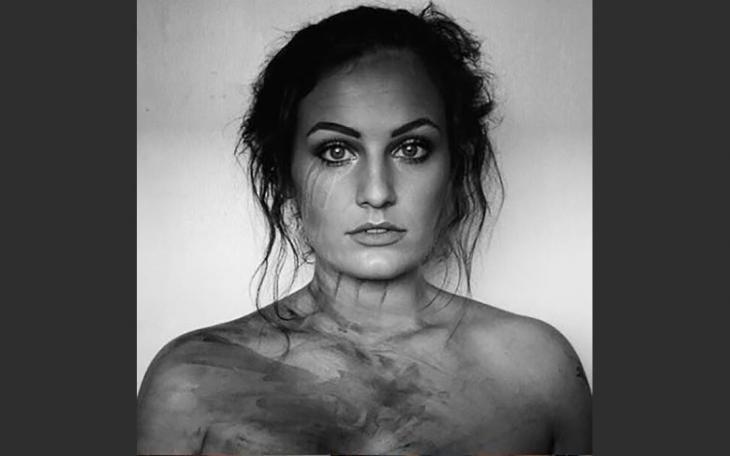 Singer/Songwriter Kat Hasty's album cover for &quot;Drowning in Dreams&quot; was taken with her iPhone after a day working as a face painter.