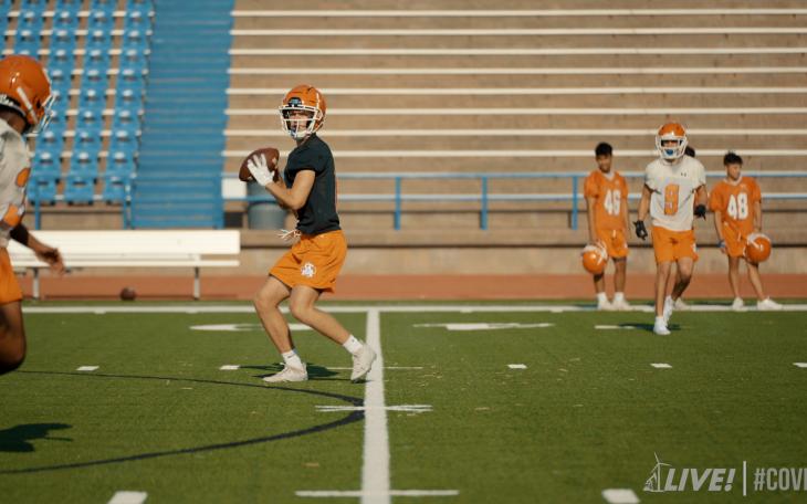 San Angelo Central QB Ben Imler takes a snap during day one of fall camp.