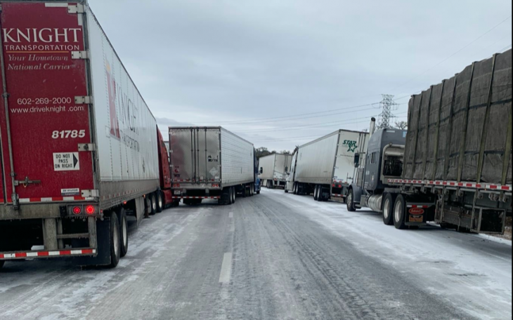 Line of Semi-Trucks on I-10 Near Kerrville