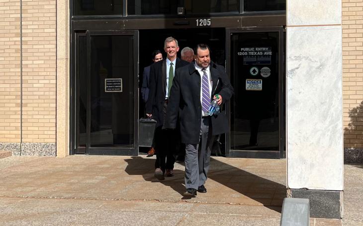 Tim Vasquez leads his attorney David Guinn out of the federal courthouse in Lubbock