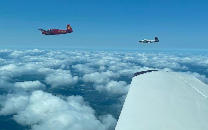 Three Mooney M20Cs practice formation flying near San Marcos in 2021