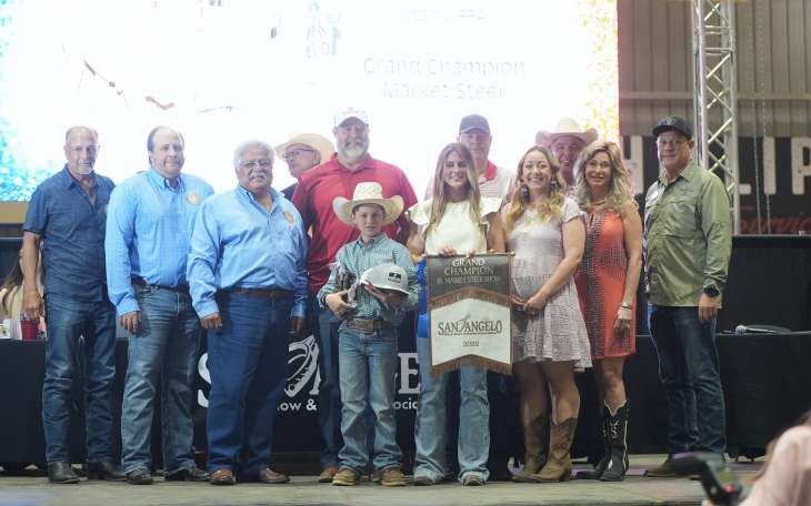 Aniston Patschke, Idalou FFA, Grand Champion Steer Along with Group of Buyers