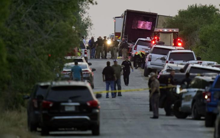 Police and other first responders work the scene where officials say dozens of people have been found dead and multiple others were taken to hospitals with heat-related illnesses after a semitrailer containing suspected migrants was found, Monday, June 27, 2022, in San Antonio. (AP Photo/Eric Gay)