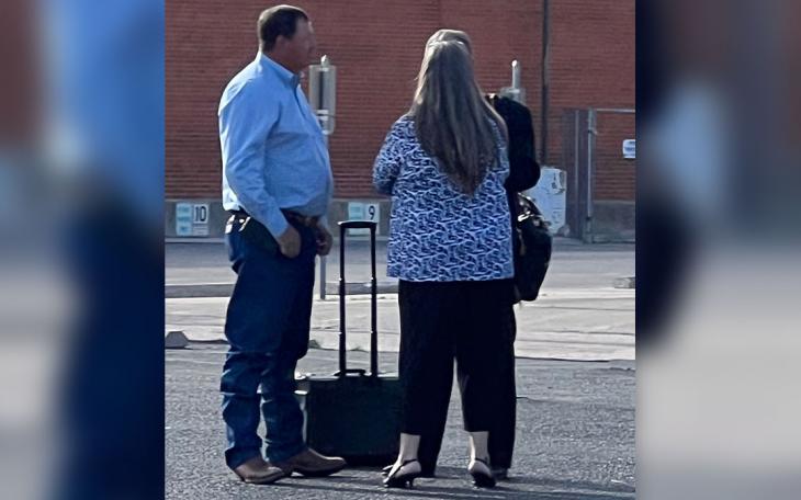 A courtroom loser, Dusty Thompson and his wife are consoled by their attorney after losing a lawsuit for deceptive trade practices.