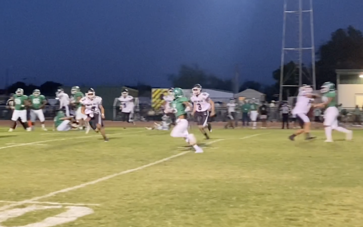 Eagles Quarterback Jason Covarrubiaz Pitches the Ball to Nino Tambunga for a good gain.