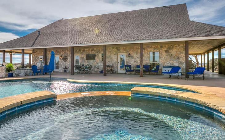 An exotic ranch with a fabulous pool.