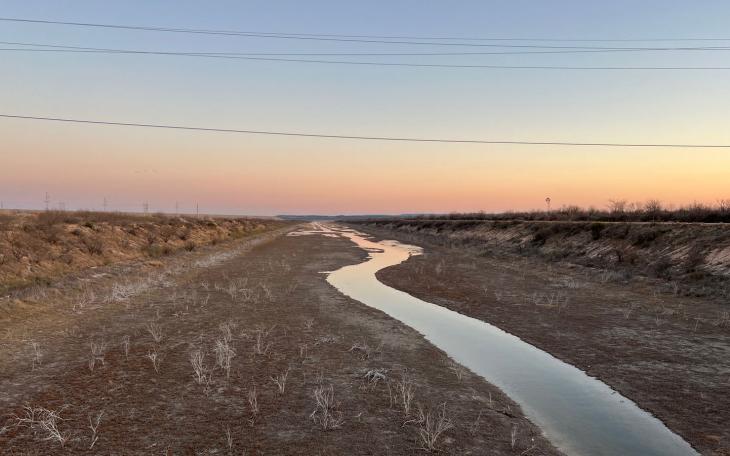 The South Concho river flows into the south pool of the Twin Buttes Reservoir system that connects the south and north pools with an equalization channel pictured here.