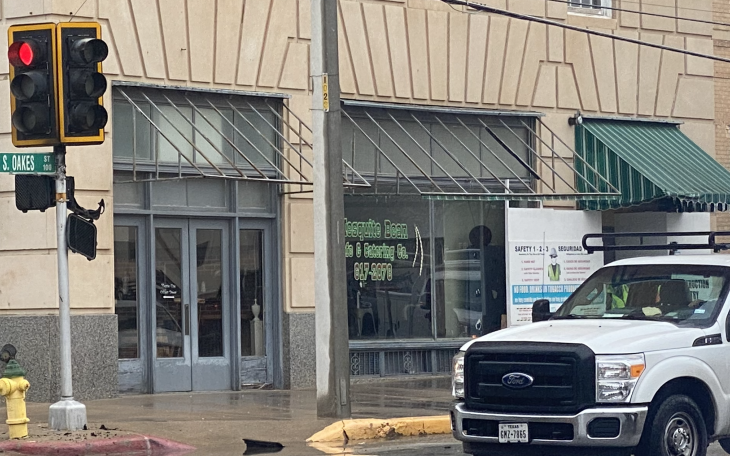A crosswalk sign on Thursday morning melted in front of the historic Cactus Hotel just steps away from its fabric awning. 