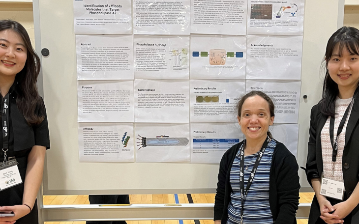 Jiyun Jeong, Dr. Edith Osborne and Doyeon Kwon with their research poster: