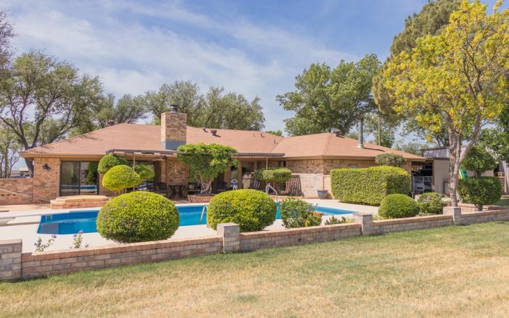 SAN ANGELO, TX — This wonderful country home provides privacy and serenity with 23.5 acres. with 2 divided pastures. Insulated workshop with 110 and 220 outlets, an additional 3-sided barn, and and covered corral with chute.