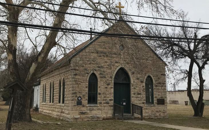 The original Sacred Heart Catholic Church of Menard built in 1899.