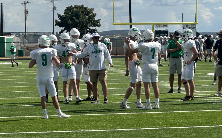 Head Coach Houston Guy and the Wall Hawks