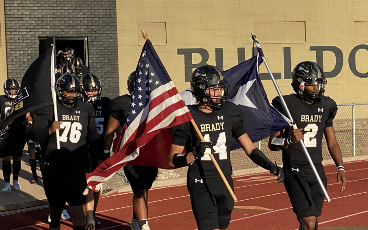 The Brady Bulldogs take the field against the Coleman Bluecats.