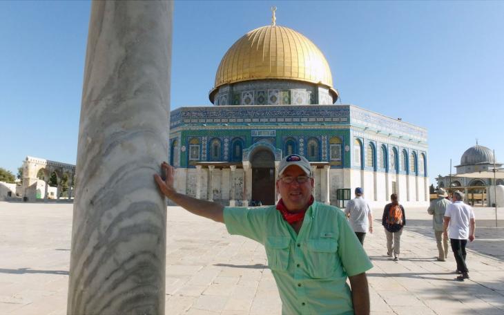 The author, Kendal Hemphill, posing for a photo in front of the Dome of the Rock Temple in Jeruseulum.