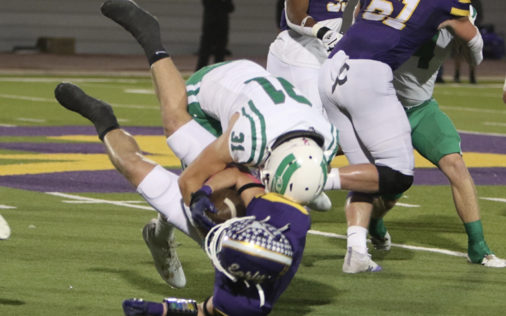 Wall linebacker Ethan Michalewicz makes a tackle against Early in 2023.