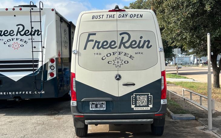 A Free rein Caoffe Co. delivery truck and motorhome stand at the ready at the San Angelo location of Free Rein Coffee Co.