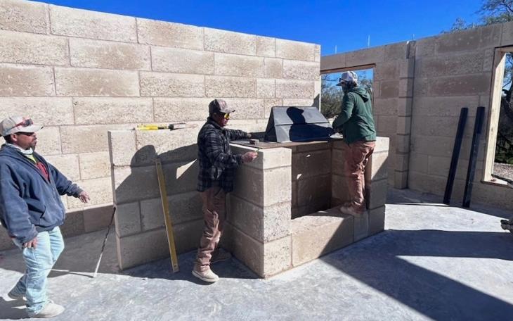 A distinctive feature of these homes is their unique exterior, constructed with a manufactured limestone known as Texas Aussie Stone.