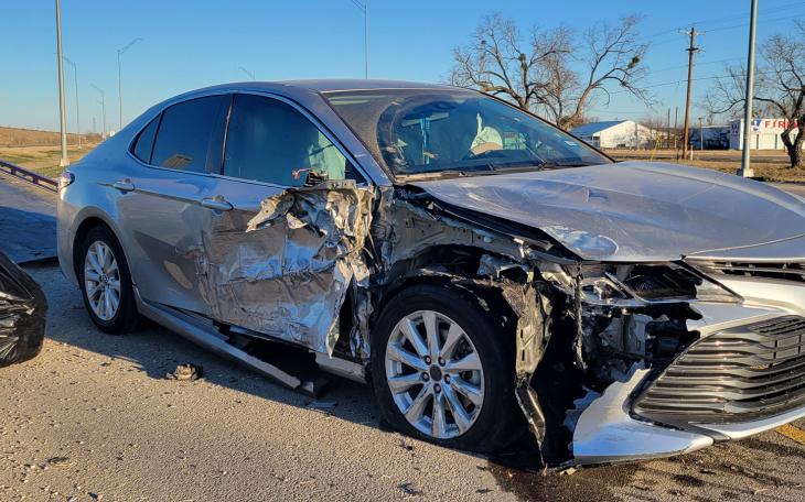Mangled metal at the intersection of FM 2105 and US 87 N