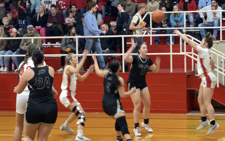 Madyson George and Halle Hughes play Keep Away from Forsan's Lilly Hoff.