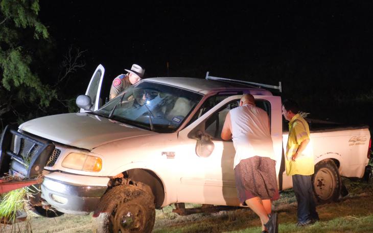 The vehicle was identified as an older white Ford F-150.