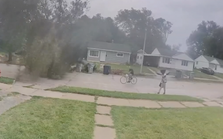 Cyclist Narrowly Escapes Injury as Tree Falls Amid Thunderstorm