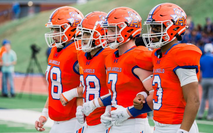Central football captains (from left) Chase Cole, Kaden Rodgers, Mason Van Sickle and Christian English walk to midfield for the coin toss before their game against Abilene High on Friday, Aug. 30, 2024, at San Angelo Stadium.