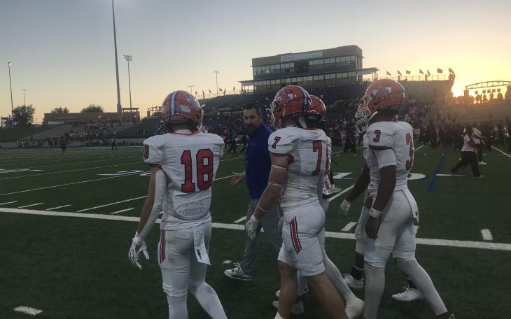 The Central Bobcats' captains prepare to walk to midfield before their game against Midland High on Friday, Oct. 25, 2024.