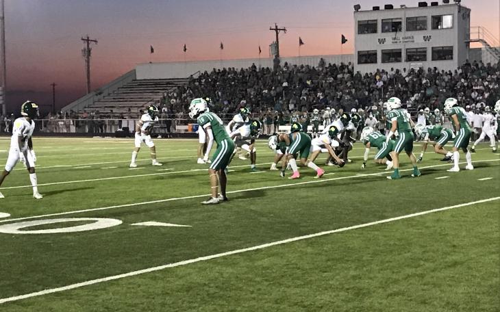 The Wall Hawks' defense prepares for the snap against Idalou on Friday, Oct. 4, 2024.