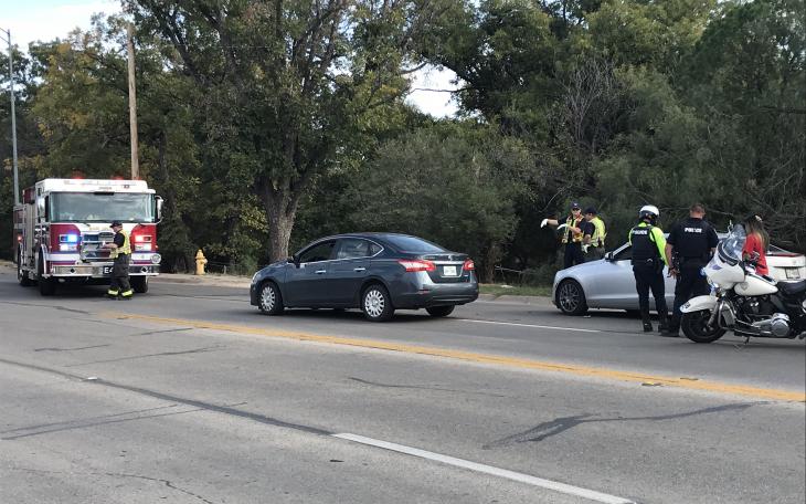A car that ran out of gas on Avenue L was struck by another vehicle at about 3 p.m. Tuesday, shutting down eastbound traffic on the road.