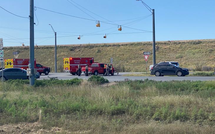Emergency responders from the San Angelo Fire Department and Texas DPS assess the scene at US-87 and FM 2105 following a two-vehicle crash on Monday morning. (Photo by San Angelo LIVE!)