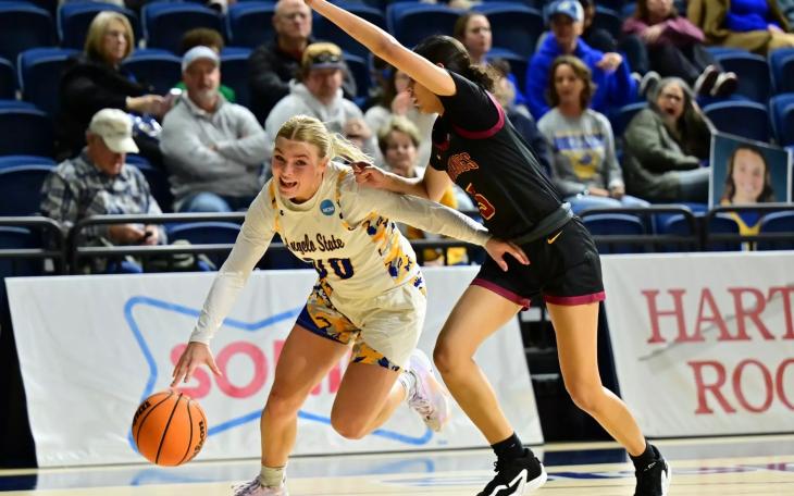 Angelo State women's basketball player Landry Morrow drives to the basket.