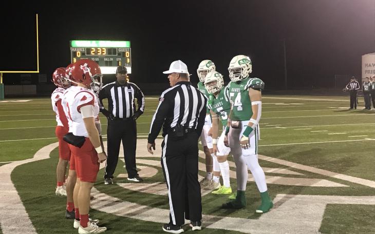 The captains for Wall and Stanton met at midfield for the coin toss Friday, Nov. 8, 2024.