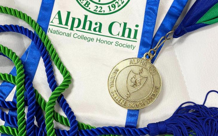 Alpha Chi stole and meda