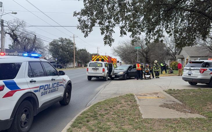 Two people were hospitalized Friday after a two-vehicle collision at the intersection of Paint Rock Road and Sellers Street.