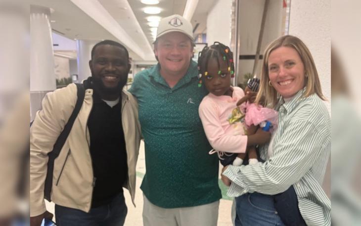 Pictured: Craig and Haley Foreman being united with their daughter, Thara.