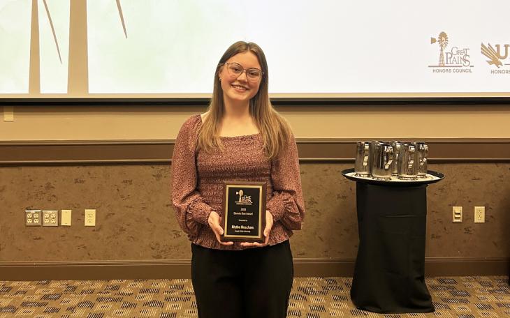 ASU honors student Blythe Meacham with her Dennis Boe Award