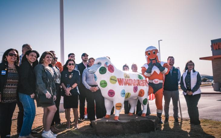 Whataburger celebrated its newest San Angelo location Tuesday morning with a ribbon-cutting ceremony and the unveiling of a custom-painted sheep sculpture at 5855 Sherwood Way.