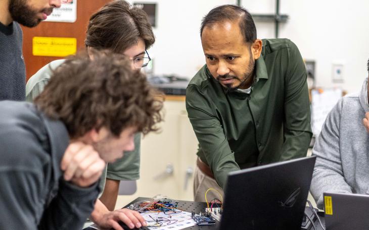 Dr. Mohammad Shafinul Haque working with ASU mechanical engineering students