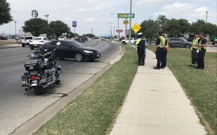 A driver involved in a crash late Wednesday morning sped away from the scene while accidentally leaving their license plate lying on the road.