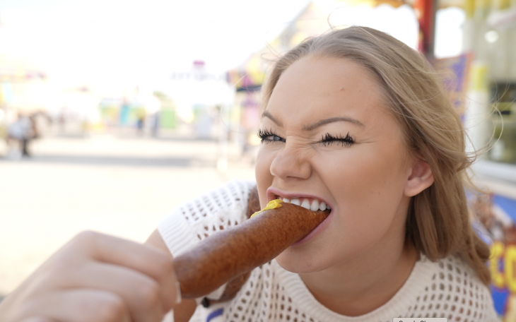 Tessa Eats a Corn Dog