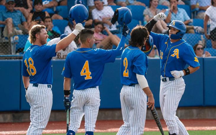 Tayten Tredaway, Austin Beck, Chase Pendley and Lane Hutchinson celebrate during the Angelo State baseball team's win over Lubbock Christian on Thursday at the NCAA Division II South Central Regional Tournament.