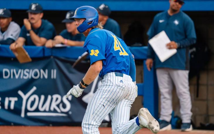 Angelo State's Justin Harris scored the game's only run in the Rams' 1-o win over St. Edward's on Friday.