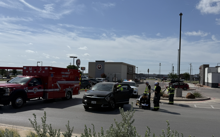 A two-vehicle crash on private property Friday in San Angelo sent a woman to the hospital.