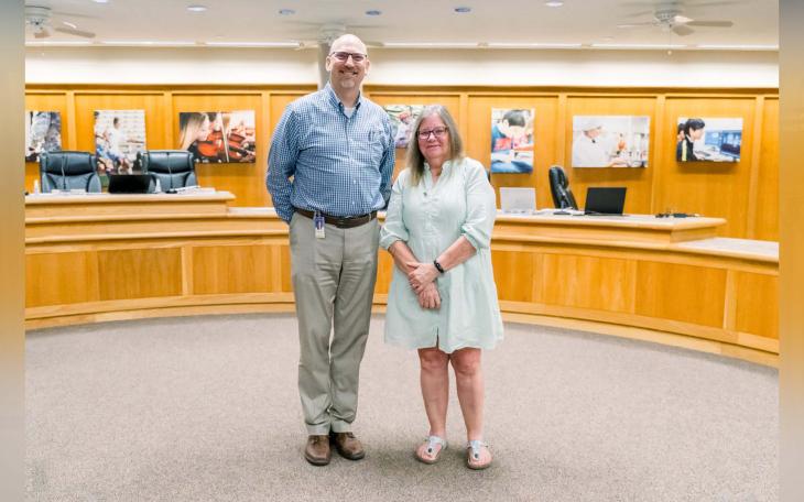 Santa Rita Elementary teacher Lynn Springer, San Angelo ISD’s 2024 Elementary Teacher of the Year, stands with Superintendent Dr. Chris Moran following her recognition at the June 16 school board meeting. (Photo by: San Angelo ISD)