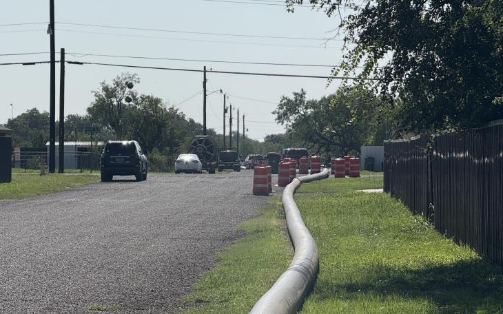 Flooding on San Angelo’s Short Street left at least one home accessible only by boat, as city crews work to pump water and officials warn against unapproved water relocation.