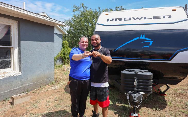 BRITTANY AND LEVERNE WERE LIVING IN A MOTEL ACROSS TOWN WITH THEIR TWO DOGS BEFORE SAMARITAN’S PURSE PROVIDED THEM A CAMPER ON THEIR PROPERTY TO MOVE INTO.