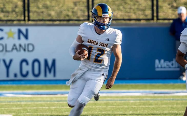 Angelo State quarterback Braeden Fuller runs for yardage against Fort Hays State on Thursday, Aug. 28, 2025.