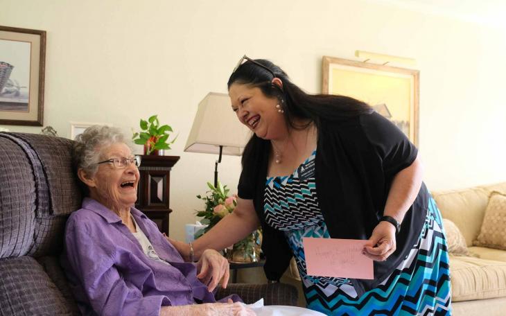 Ida Walter, seated, shares a laugh with Norma Dietz Lee, executive director of Meals for the Elderly, during Walter’s 101st birthday celebration Friday in San Angelo.