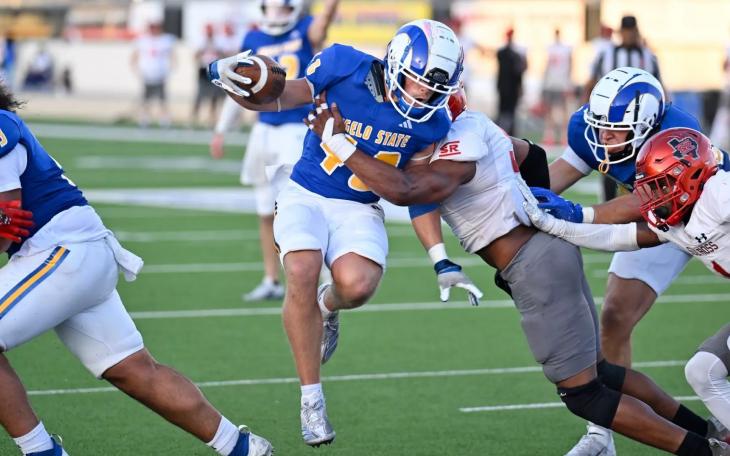 Angelo State running back Cameron Dischler battles for yardage against Sul Ross State in 2024.