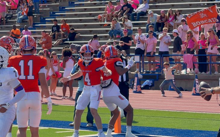 Central quarterback Micah Smith (4) celebrates with wide receiver Gabriel Garcia (1) after a touchdown pass against Midland High on Saturday, Oct. 25, 2025.